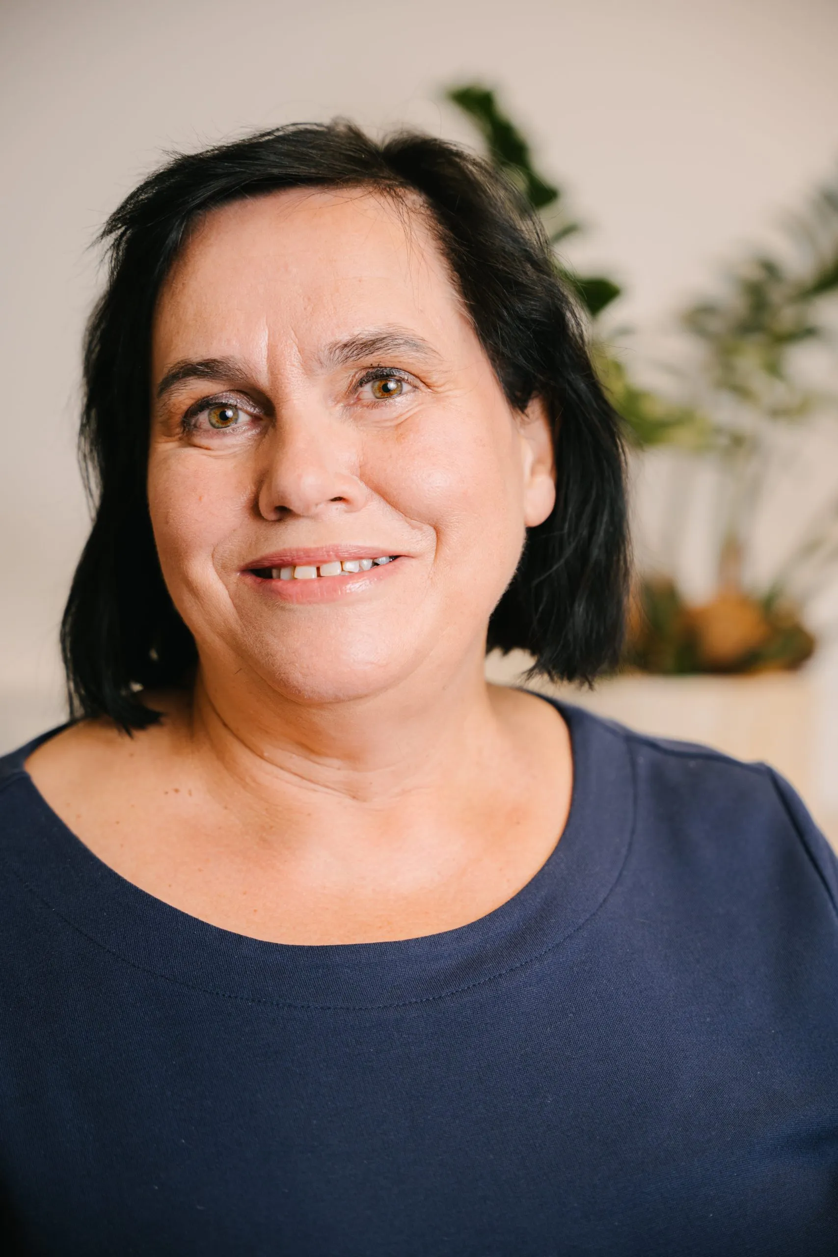 Lächelnde Mitarbeiterin aus dem Team von Silenza Pflege Jena